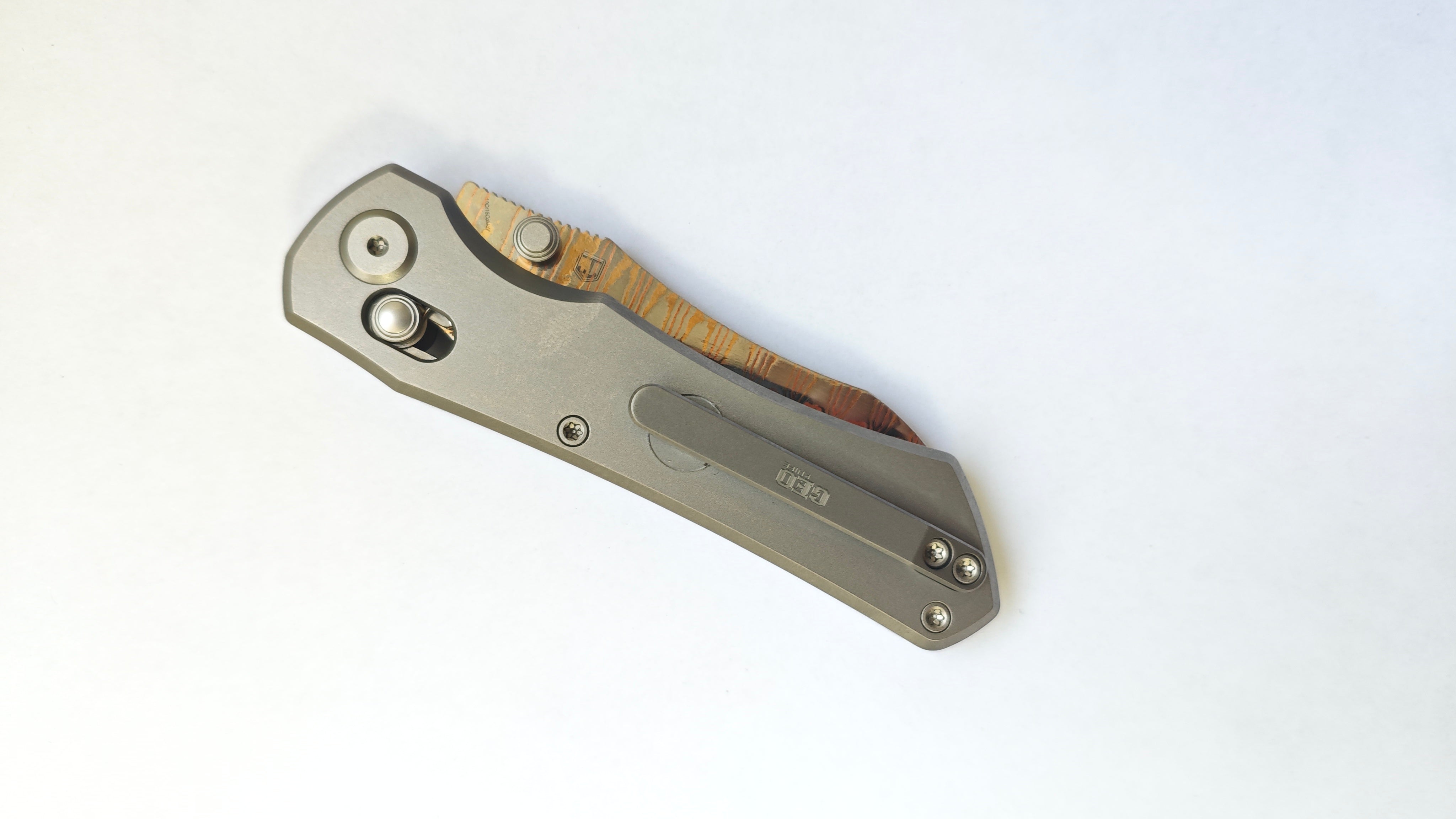 GEO Knife Komodo Axis lock Folding Knife Gray 6AL4V Titanium Handle 3.1" Damascus Steel & Copper Blade（10Cr15CoMoV) GEO2509A